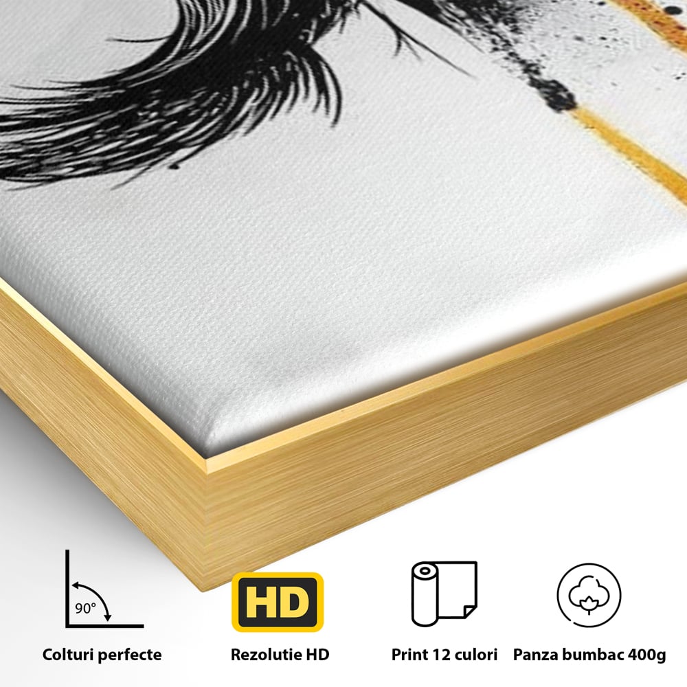 Detaliu al suprafetei: tablou canvas cu ochi stilizat, in rama de aluminiu auriu